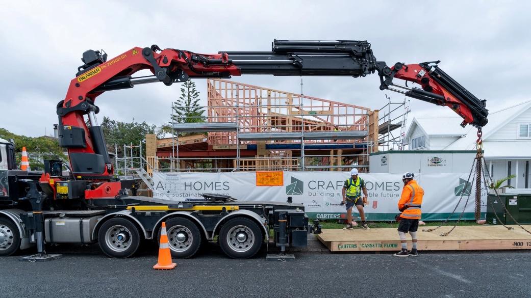 The Craft Homes team unloads materials for their new build at Red Beach, Whangaparaoa